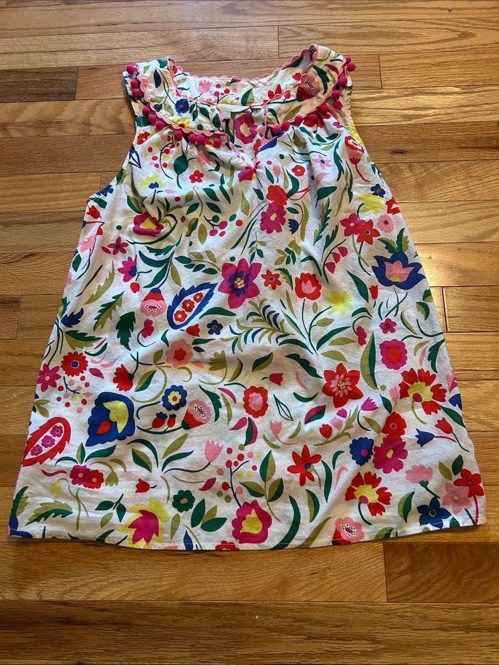 Boden Rickrack and Pom top. White and bright whimsical folk floral print. Size 4